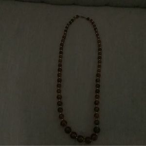 Beautiful necklace with amber colored beads